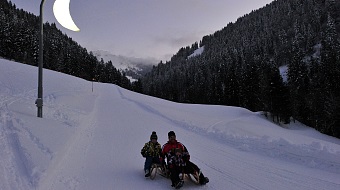 Pista di slittino al chiaro di luna